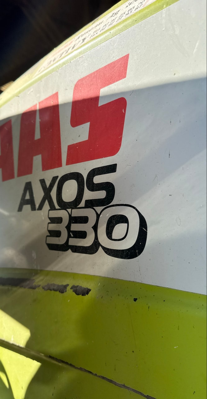 Tracteur CLAAS AXOS 330 - photo slide 10