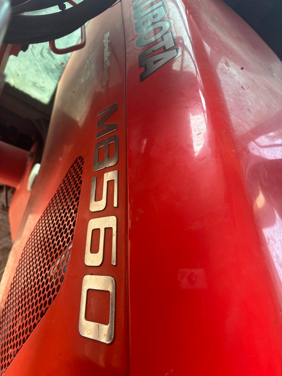 Tracteur chargeur KUBOTA M 8560 DTHQ - photo slide 5