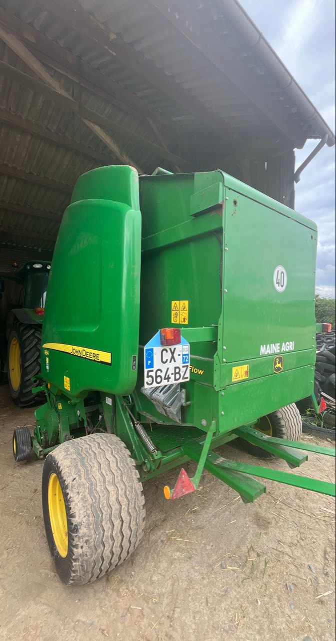 Presse balles rondes JOHN DEERE 864 - photo slide 3