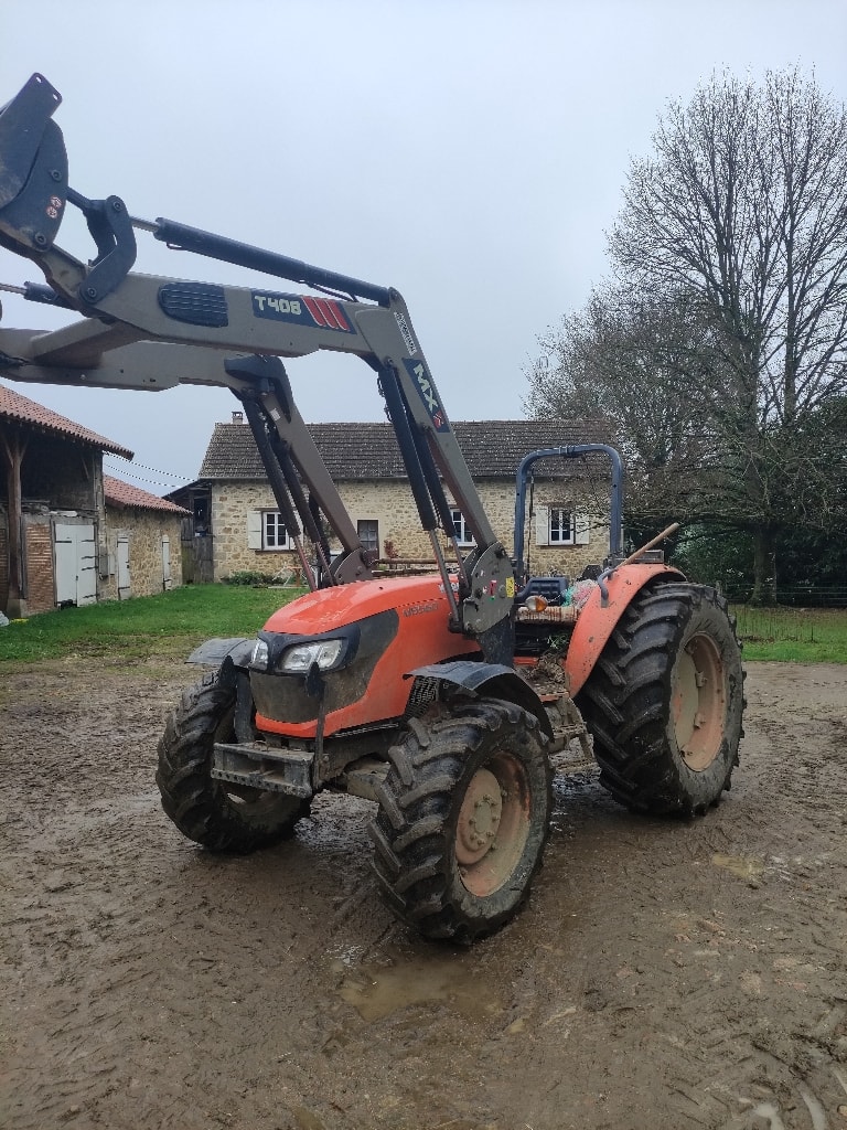 Tracteur chargeur KUBOTA M8560 DTH - photo slide 1
