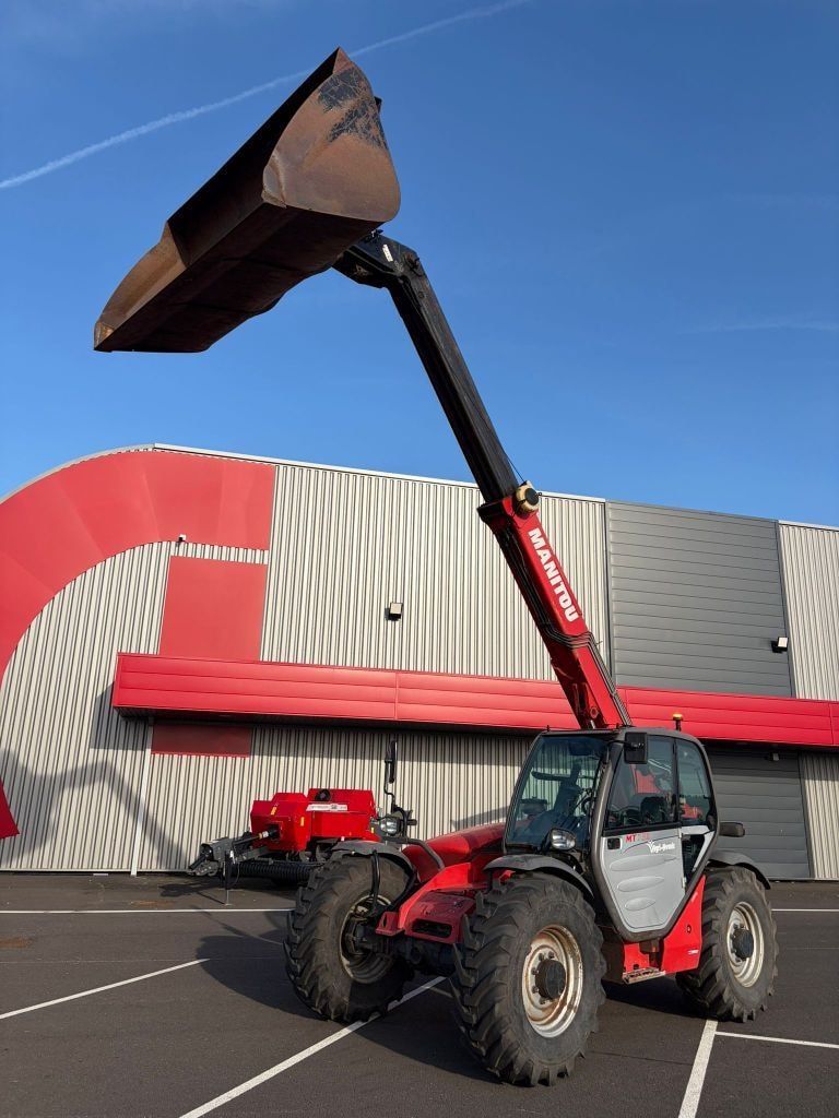 Telescopique MANITOU MT 732 - photo slide 1
