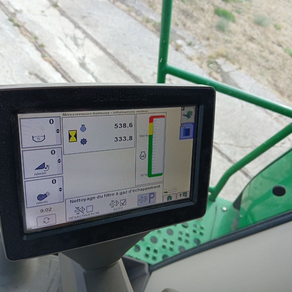 Moissonneuse JOHN DEERE T550 HM - photo slide 8