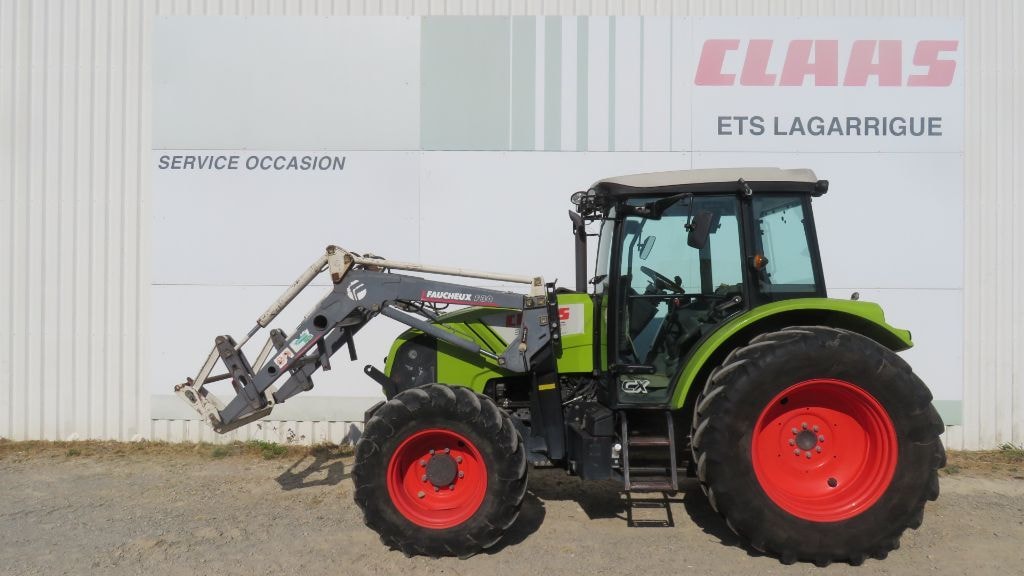 Tracteur chargeur CLAAS AXOS 320 CX  - photo slide 1