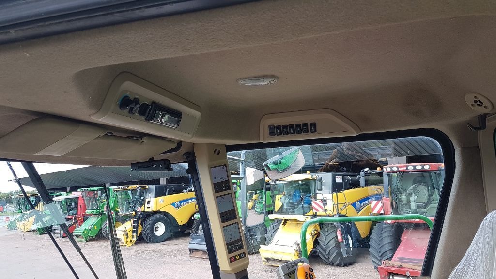 Moissonneuse JOHN DEERE C670 - photo slide 19