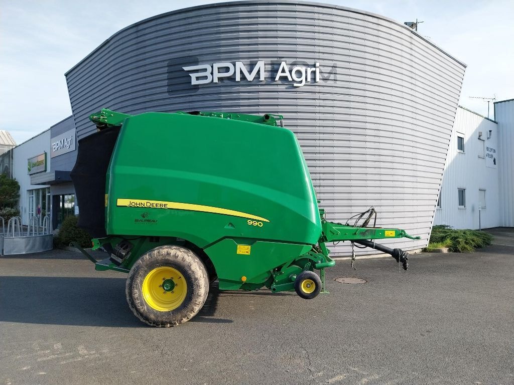 Presse balles rondes JOHN DEERE 990 - photo slide 4
