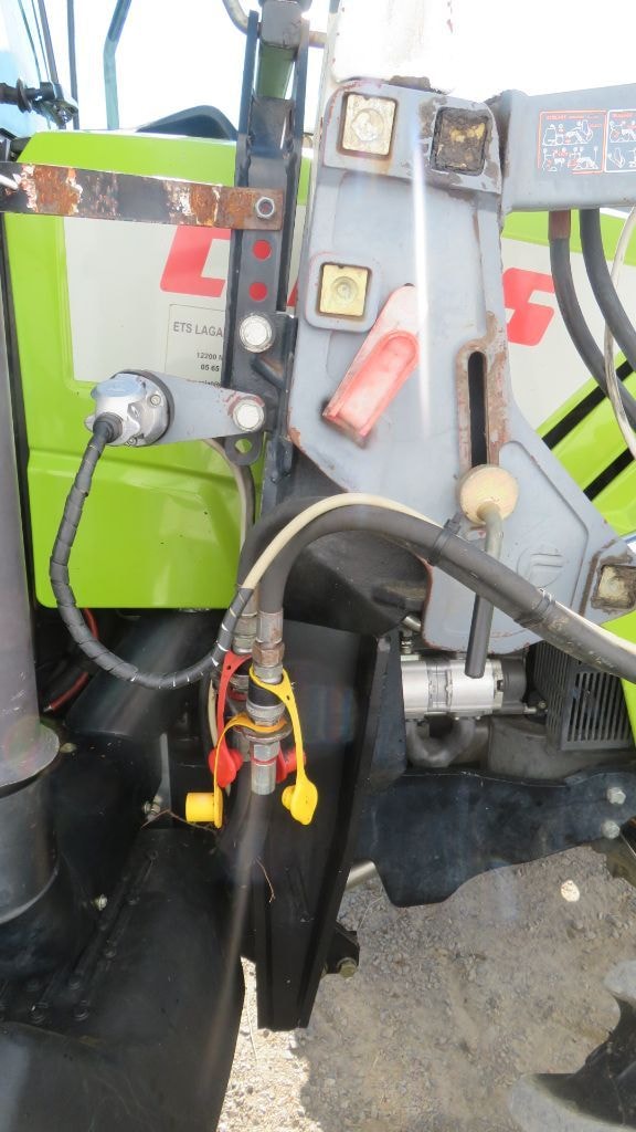 Tracteur chargeur CLAAS AXOS 320 CX  - photo slide 33