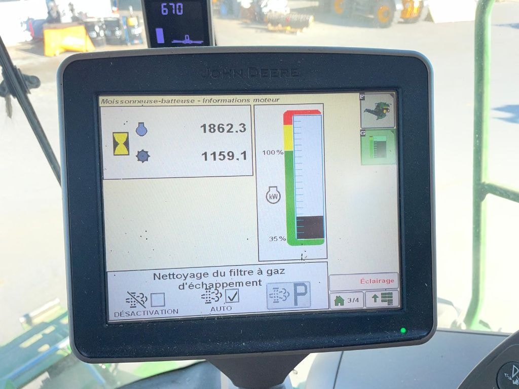 Moissonneuse JOHN DEERE T560i - photo slide 11
