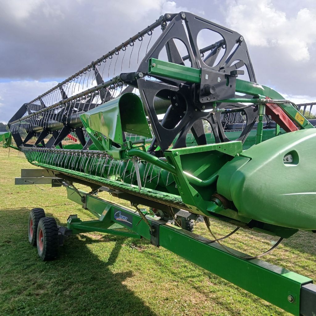 Moissonneuse JOHN DEERE T550 HM - photo slide 11