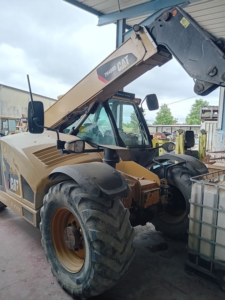 Telescopique CATERPILLAR TH 408 D - photo slide 4