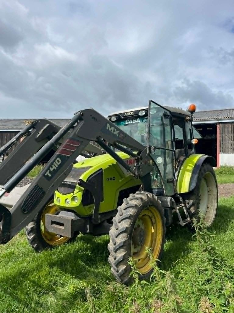 Tracteur CLAAS AXOS 340 - photo slide 1