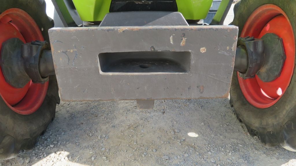 Tracteur chargeur CLAAS AXOS 320 CX  - photo slide 23