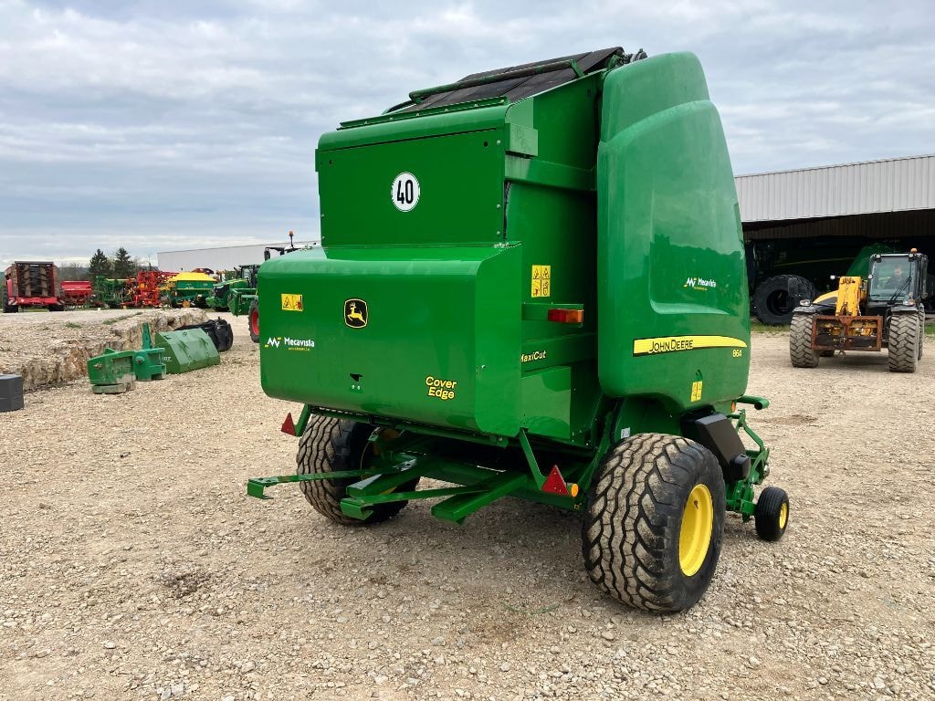 Presse balles rondes JOHN DEERE 864 MAXICUT - photo slide 9