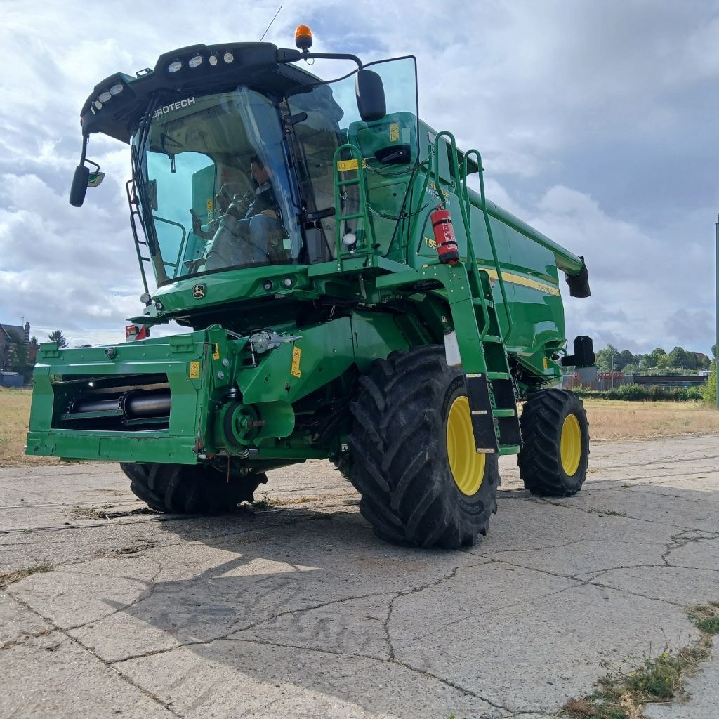 Moissonneuse JOHN DEERE T550 HM - photo slide 2