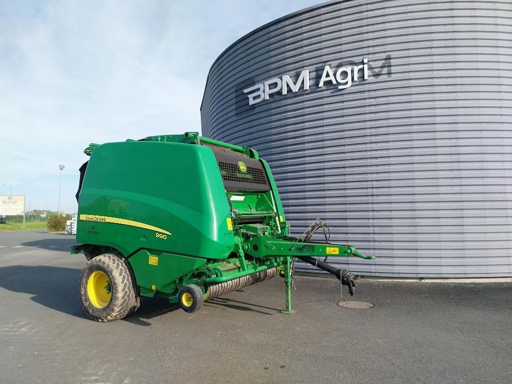 Presse balles rondes JOHN DEERE 990 - photo slide 5