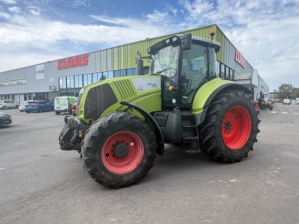 Tracteur CLAAS AXION 820 - photo slide 1