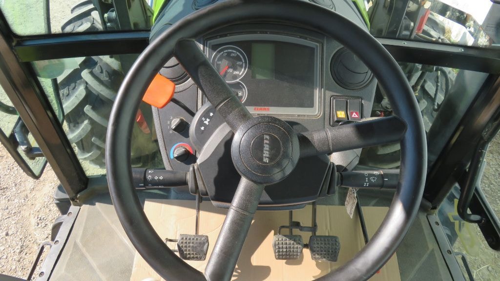 Tracteur chargeur CLAAS AXOS 320 CX  - photo slide 10