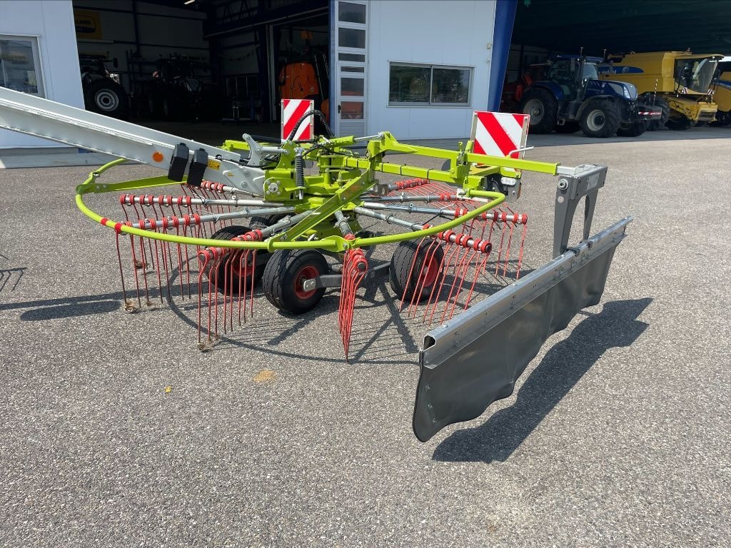Andaineur CLAAS Liner 700 Twin - photo slide 9