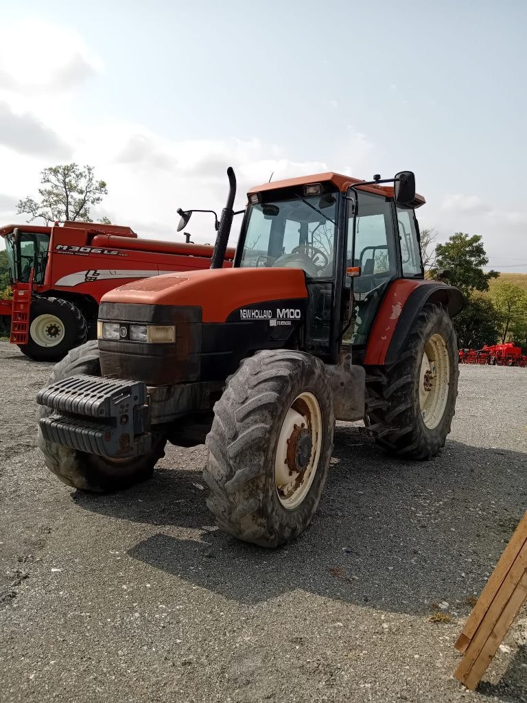 Tracteur NEW HOLLAND M100 - photo slide 1