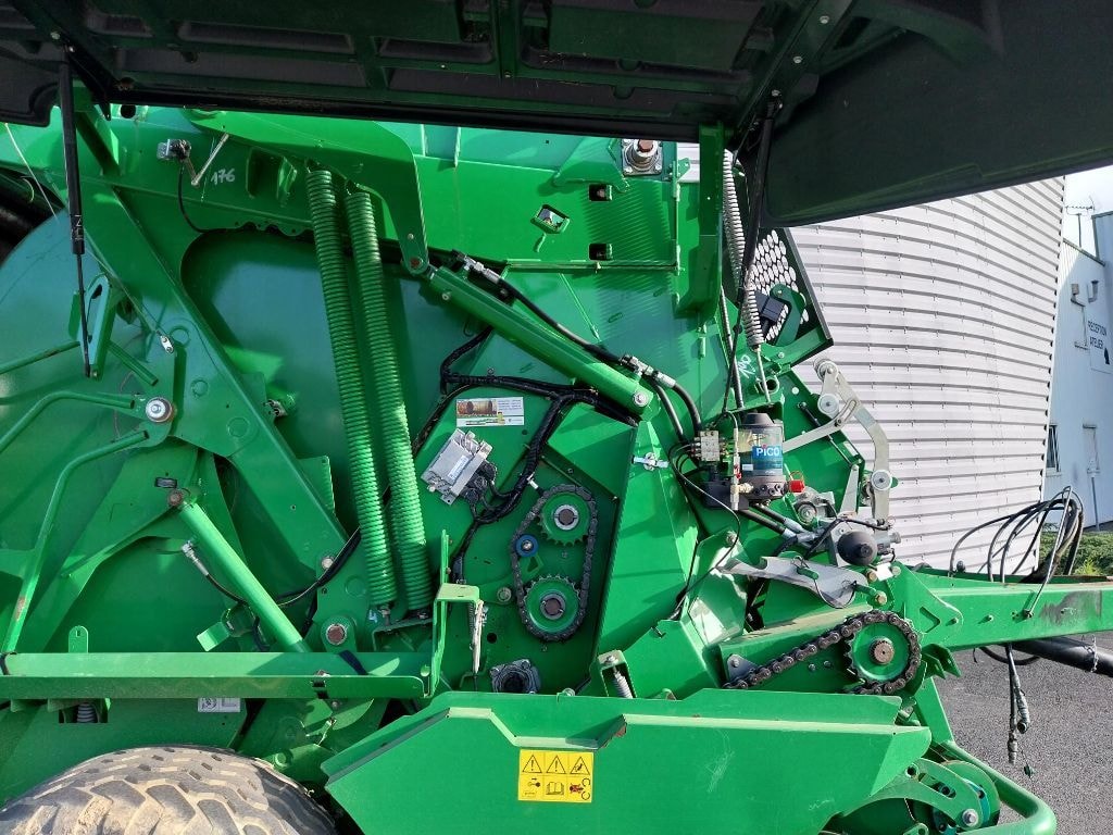 Presse balles rondes JOHN DEERE 990 - photo slide 11