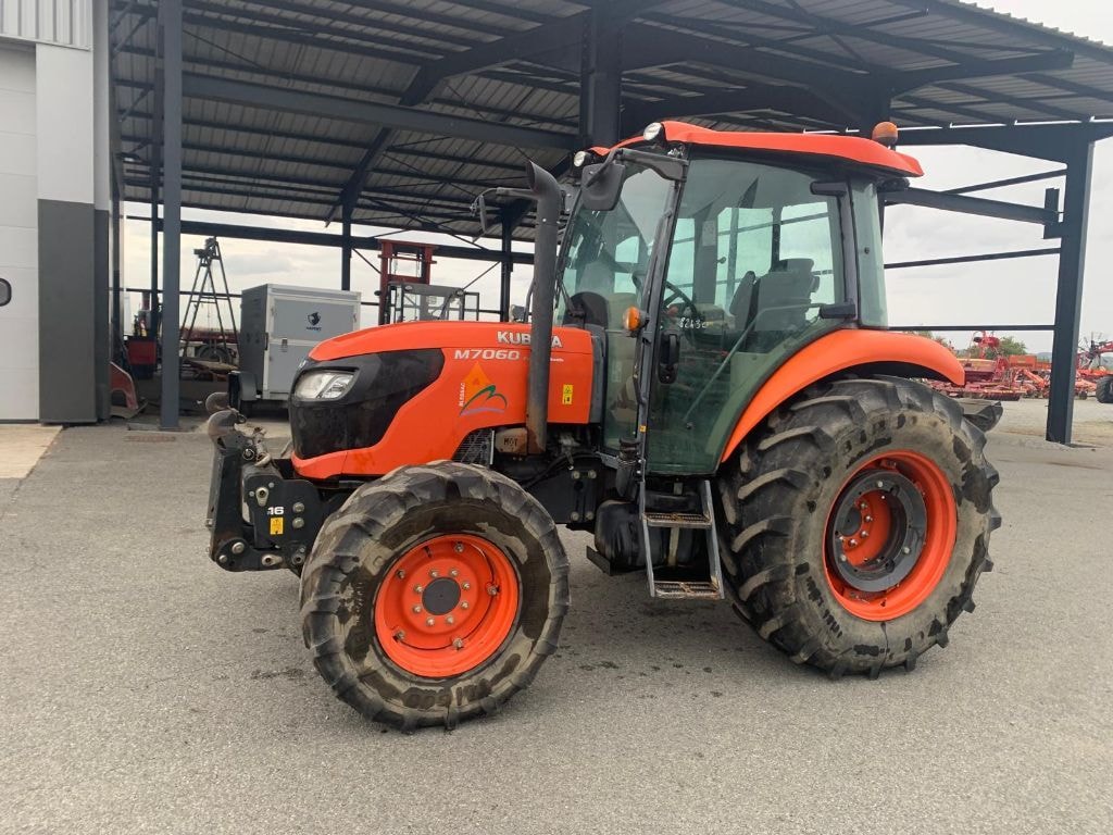 Tracteur KUBOTA M7060 - photo slide 19