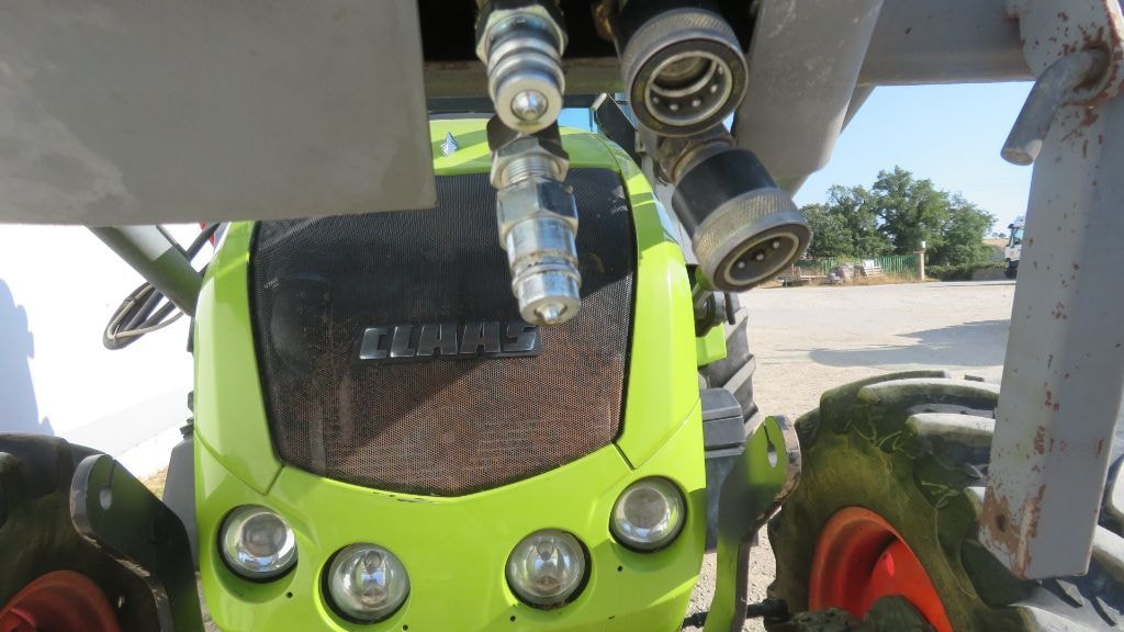 Tracteur chargeur CLAAS AXOS 320 CX  - photo slide 31