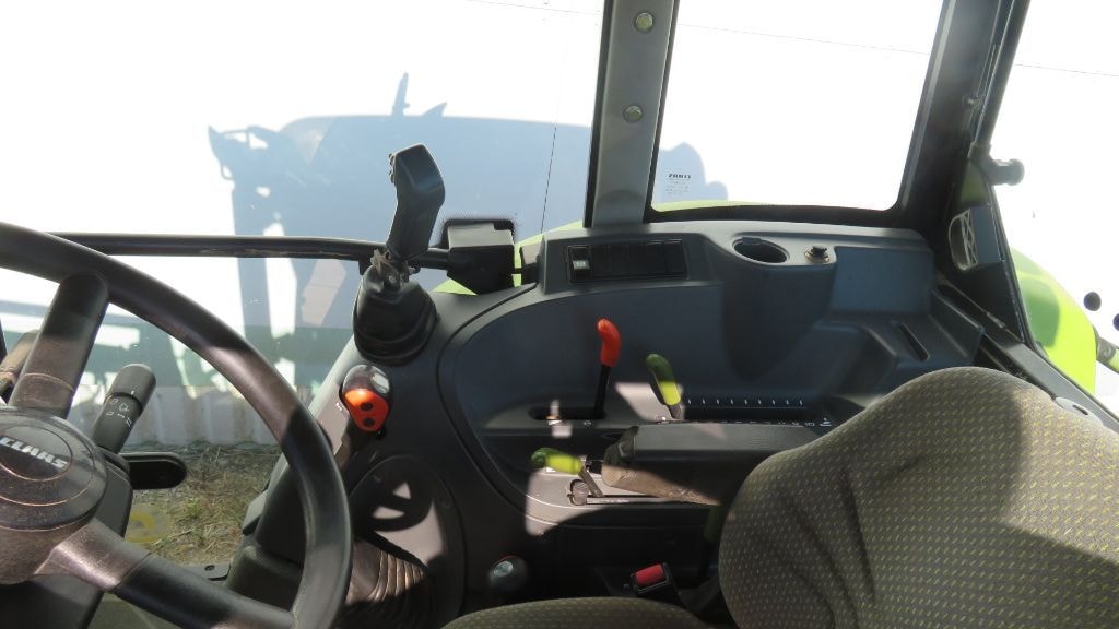 Tracteur chargeur CLAAS AXOS 320 CX  - photo slide 9