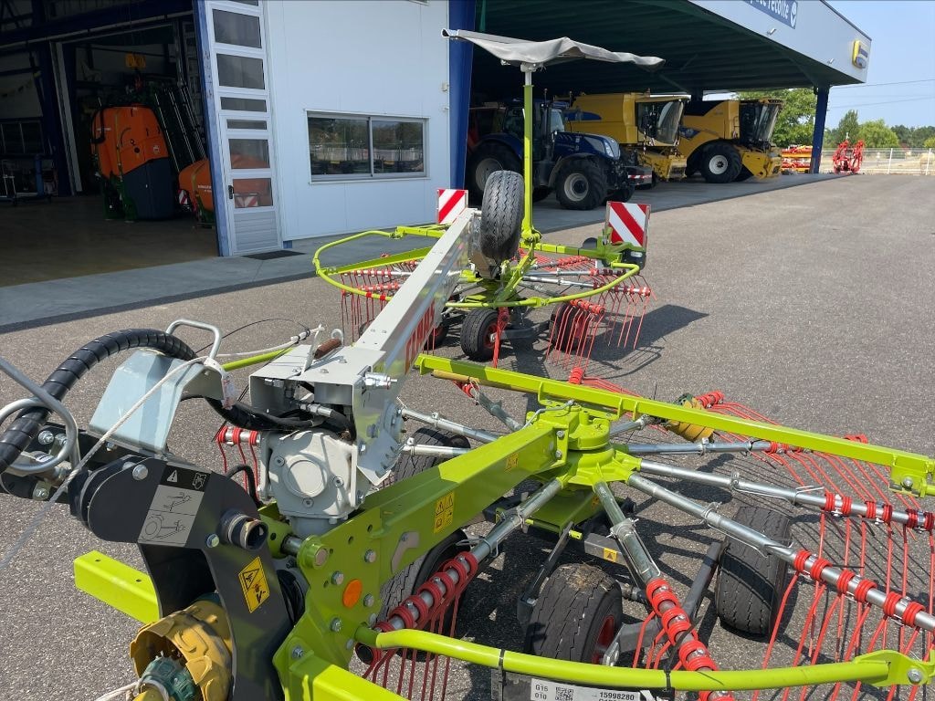 Andaineur CLAAS Liner 700 Twin - photo slide 7