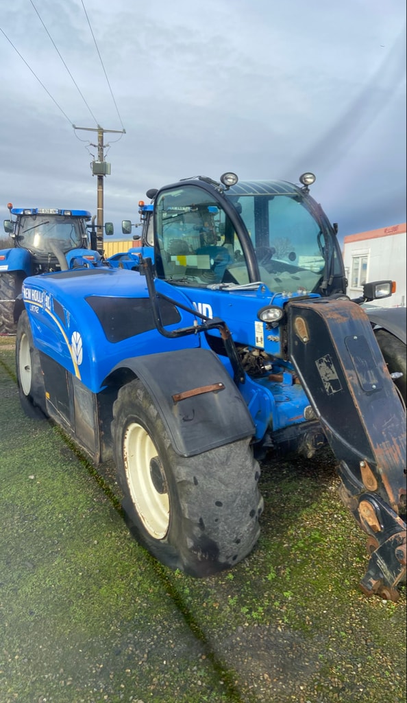 Telescopique NEW HOLLAND LM 7.42 - photo slide 1