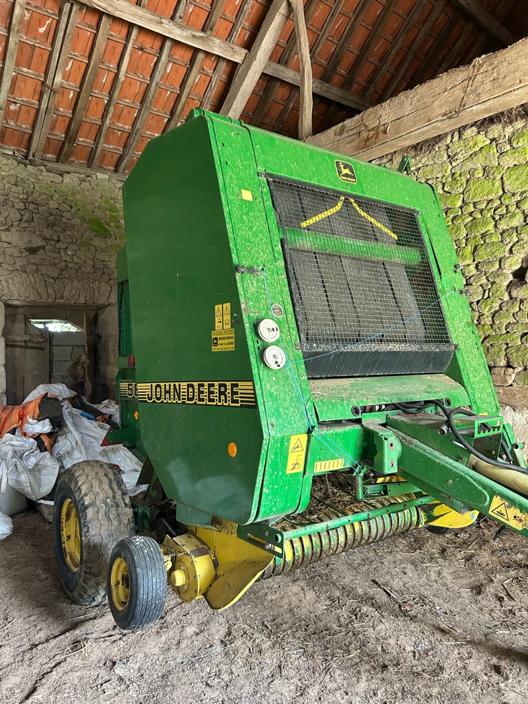 Presse balles rondes JOHN DEERE 580 - photo slide 7