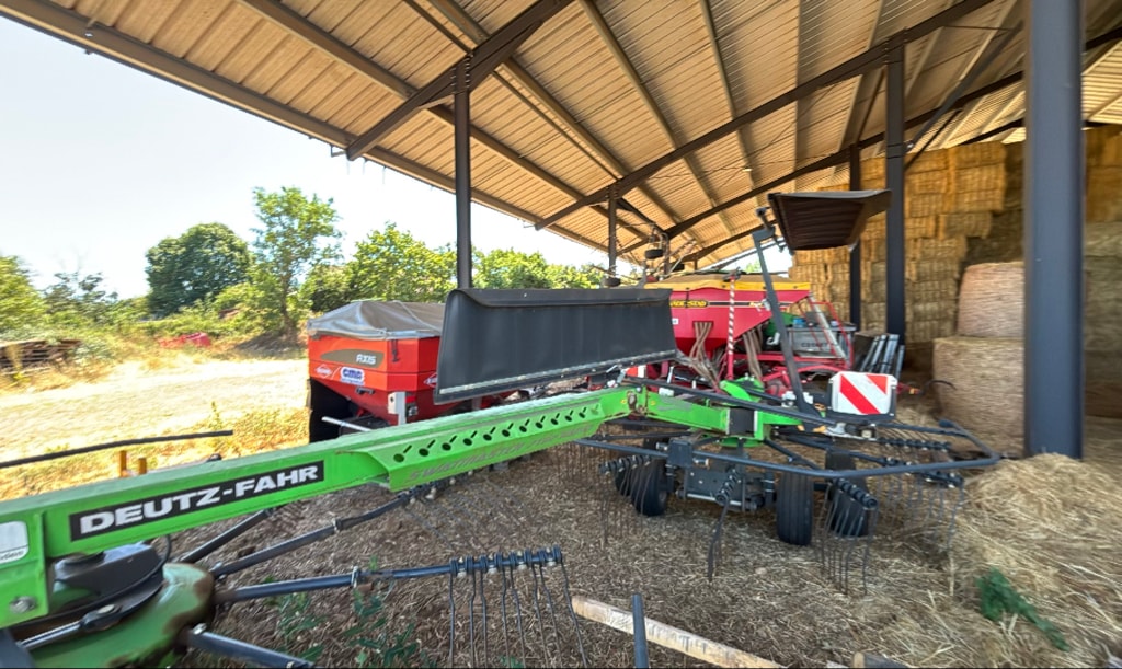 Andaineur DEUTZ FAHR Swathmaster 7132 vario - photo slide 9