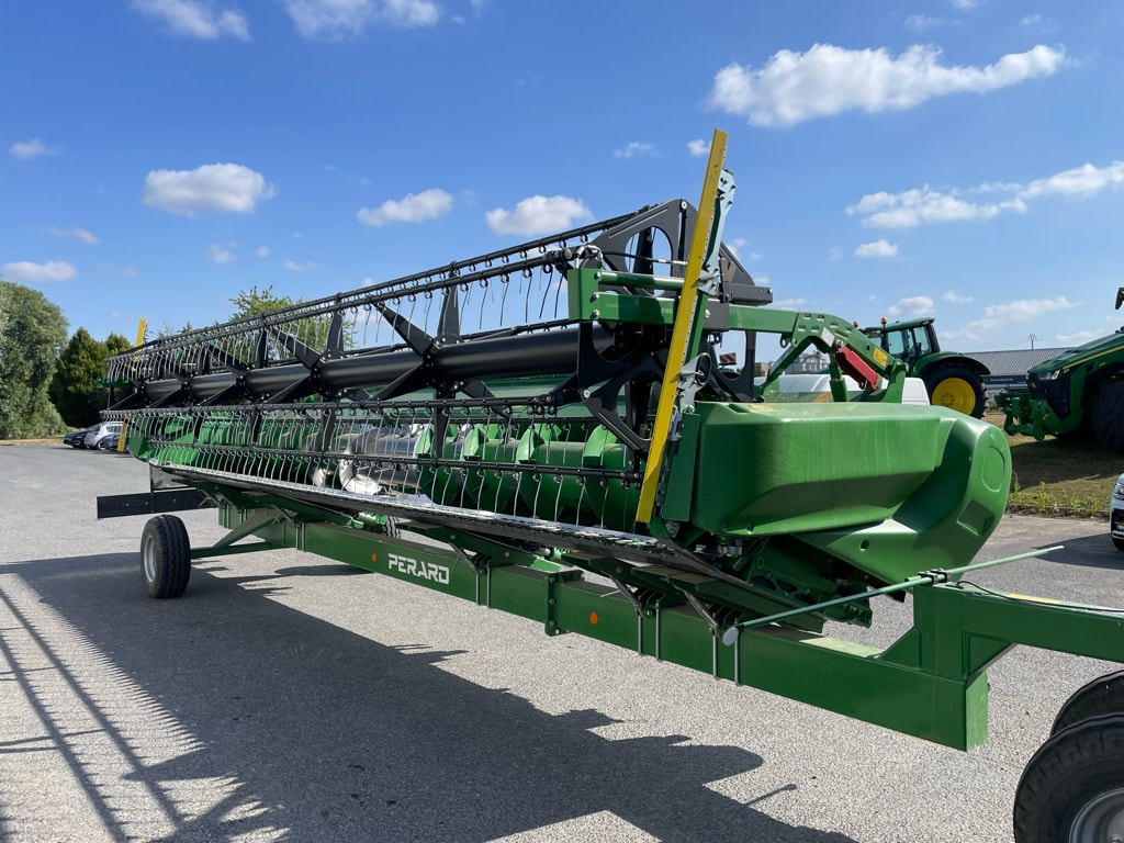 Moissonneuse JOHN DEERE T560 - photo slide 12