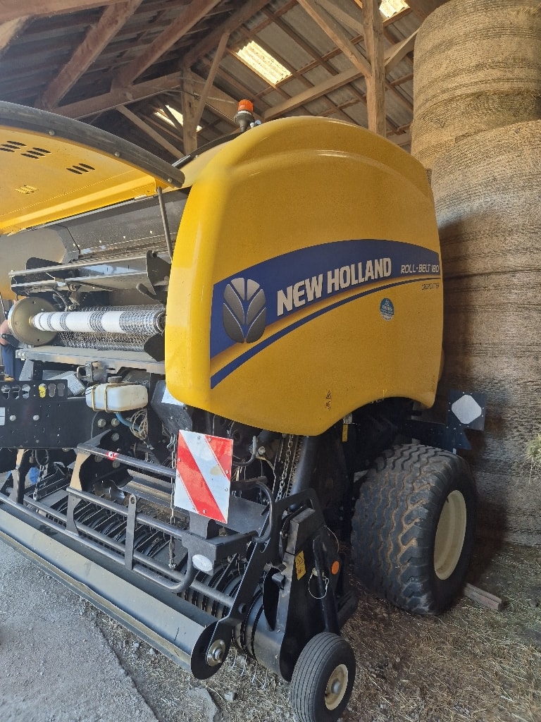 Presse balles rondes NEW HOLLAND Roll belt 180 CROP CUTTER - photo slide 1