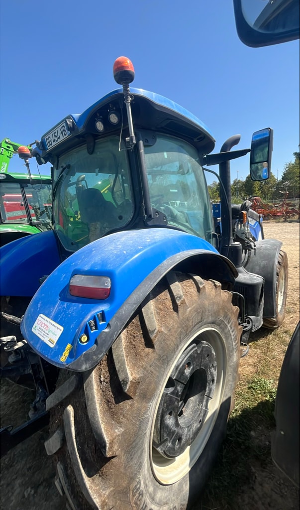 Tracteur chargeur NEW HOLLAND T7210 - photo slide 1