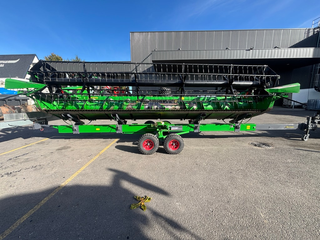 Moissonneuse JOHN DEERE T560 HM - photo slide 11