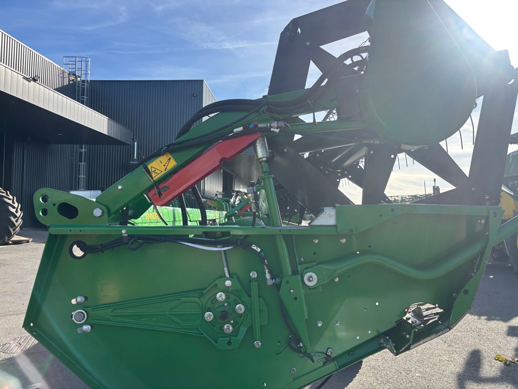 Moissonneuse JOHN DEERE T560 HM - photo slide 15