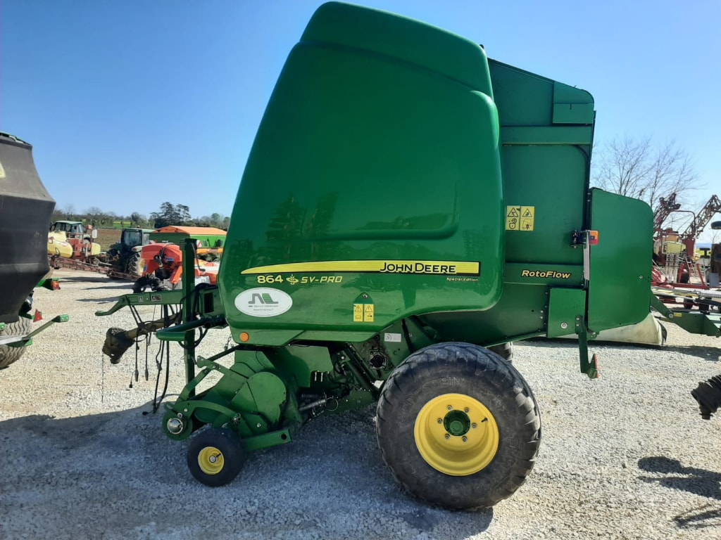 Presse balles rondes JOHN DEERE 864 - photo slide 3