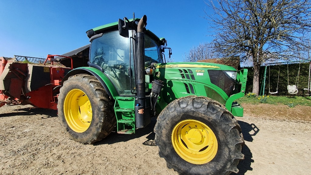 Tracteur chargeur JOHN DEERE 6115R - photo slide 1