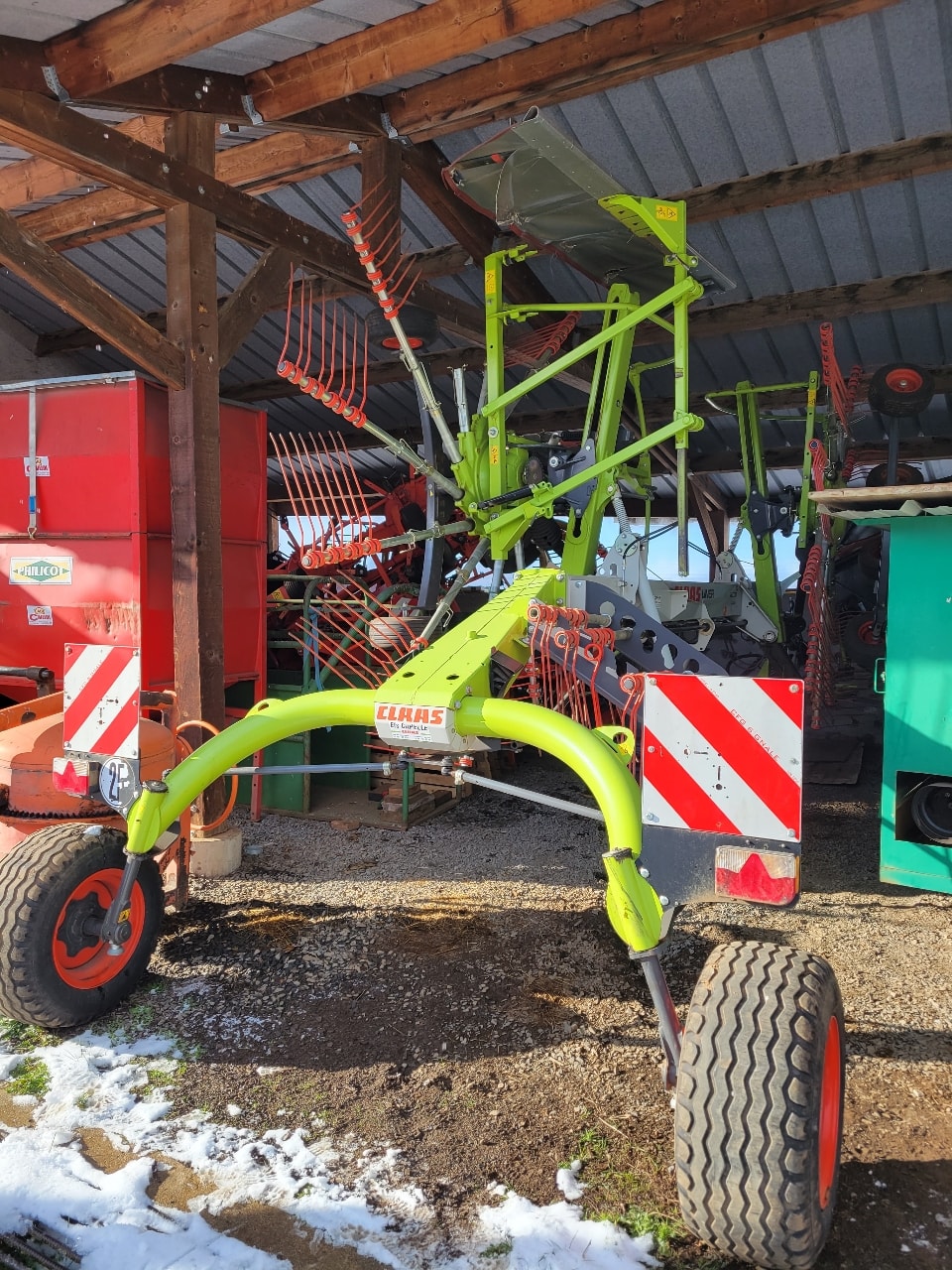 Andaineur CLAAS LINER 1650 TWIN - photo slide 1