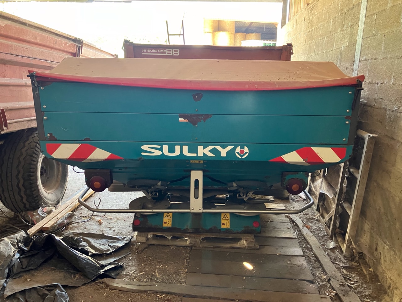 Epandeur engrais SULKY DX 20 + - photo slide 1